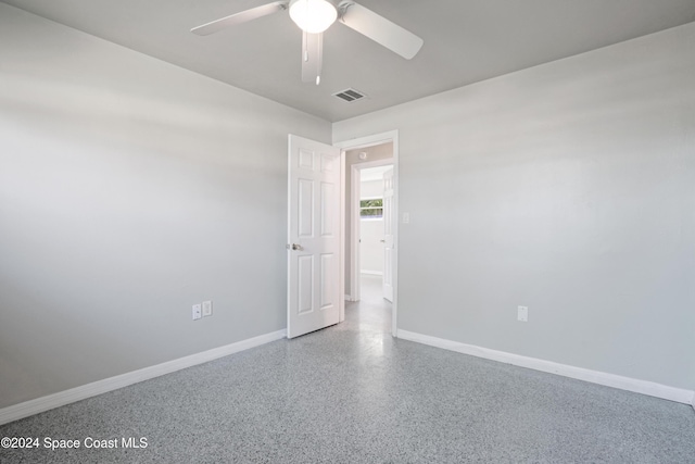 empty room with ceiling fan