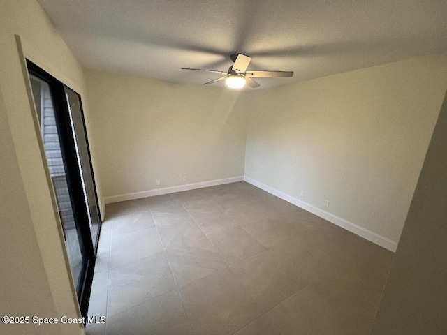 unfurnished room featuring ceiling fan