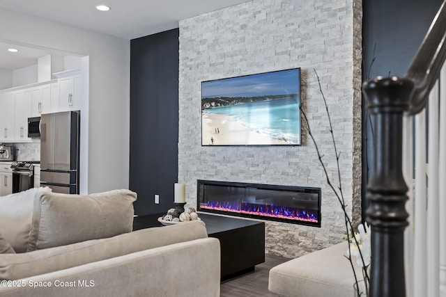 living room featuring a fireplace