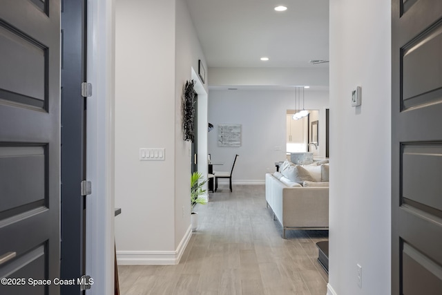 hallway featuring light hardwood / wood-style floors