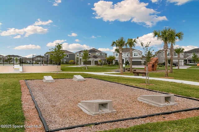 view of home's community featuring a yard