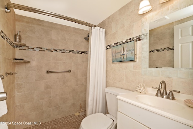 bathroom with a shower with shower curtain, backsplash, vanity, tile walls, and toilet