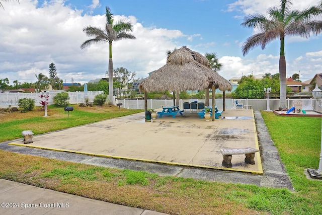 view of community with a gazebo and a yard