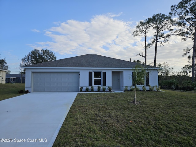 ranch-style house with a garage and a front lawn