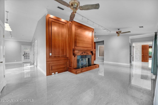 unfurnished living room with ceiling fan, a large fireplace, crown molding, and vaulted ceiling