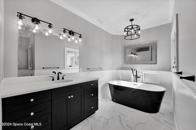 bathroom featuring vanity, a bathtub, and crown molding