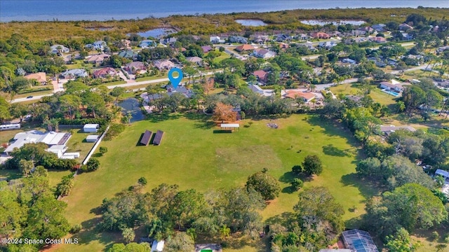 bird's eye view with a water view