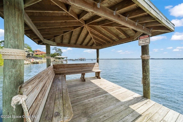 view of dock with a water view