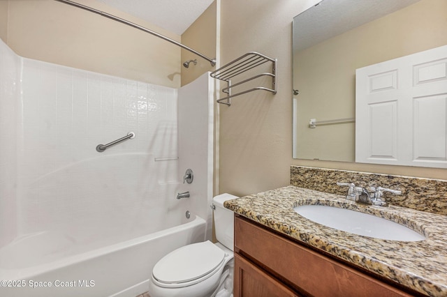 full bathroom featuring vanity, toilet, and washtub / shower combination