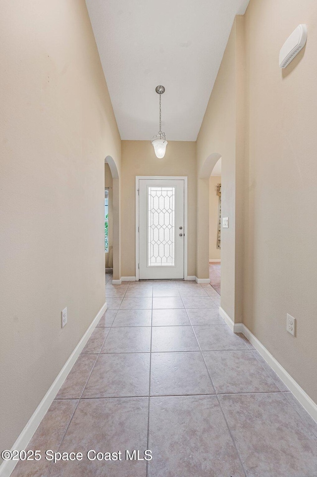 foyer with light tile patterned floors