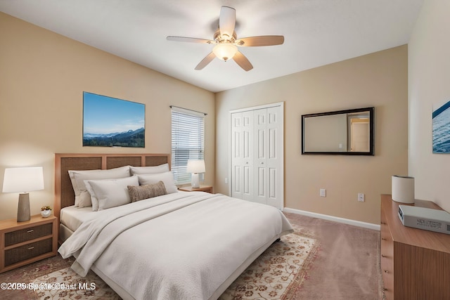 bedroom featuring carpet flooring, ceiling fan, and a closet