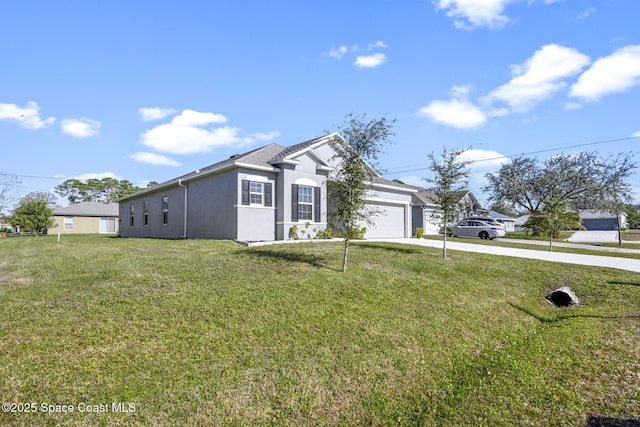 view of front of house featuring a front yard and a garage