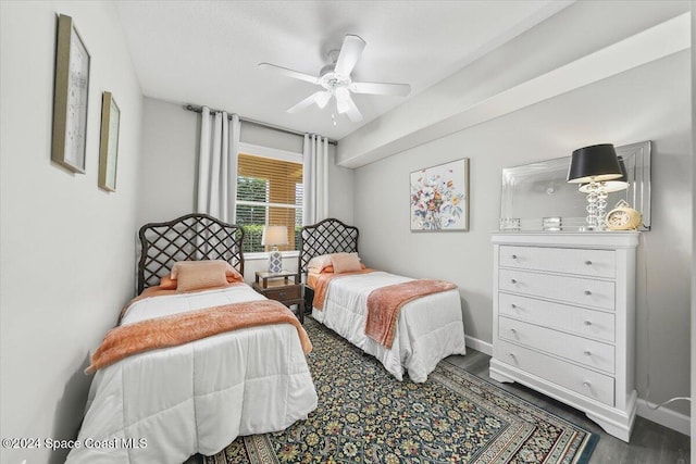 bedroom with hardwood / wood-style floors and ceiling fan