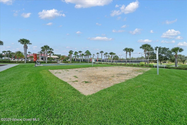 view of community featuring a yard and volleyball court