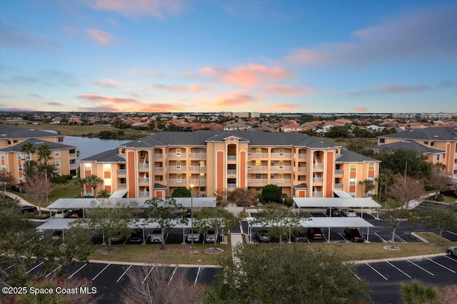 outdoor building at dusk with a water view