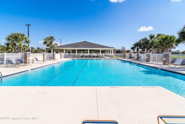 view of swimming pool featuring a patio