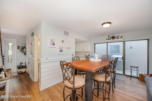 dining room featuring hardwood / wood-style flooring