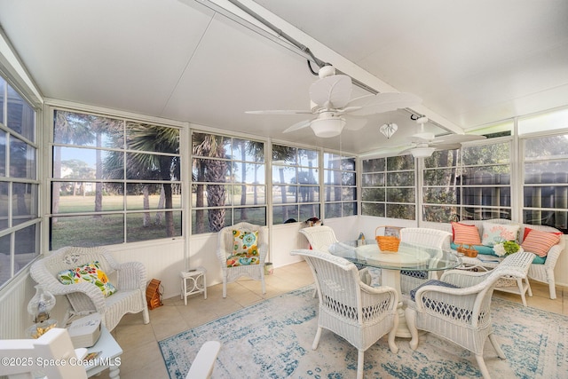 sunroom / solarium with ceiling fan