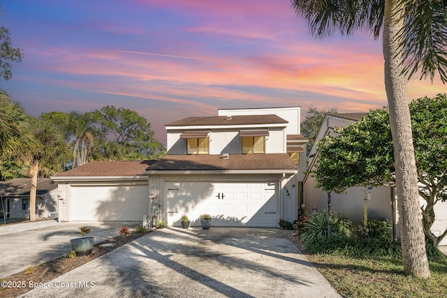 view of front of home with a garage