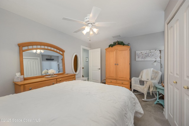 bedroom with carpet floors, a closet, and ceiling fan