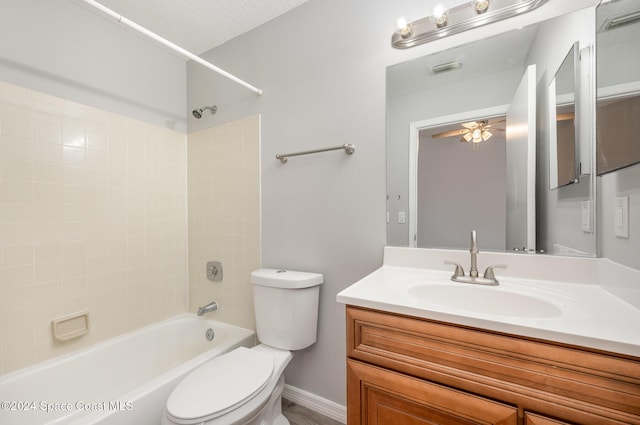 full bathroom with shower / tub combination, vanity, and toilet