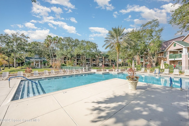 view of pool with a patio