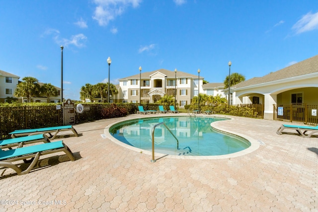 view of pool with a patio