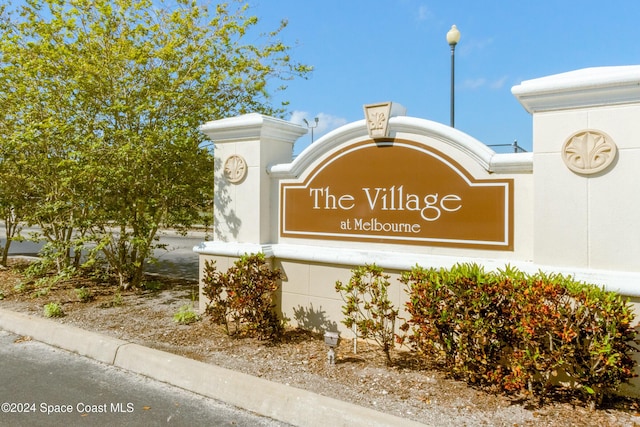 view of community sign