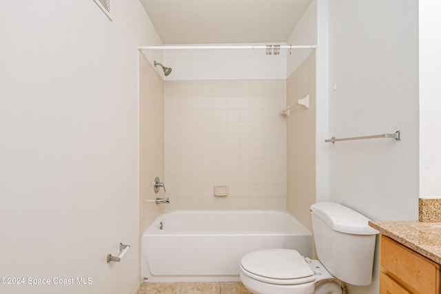 full bathroom featuring tile patterned floors, vanity, toilet, and tiled shower / bath