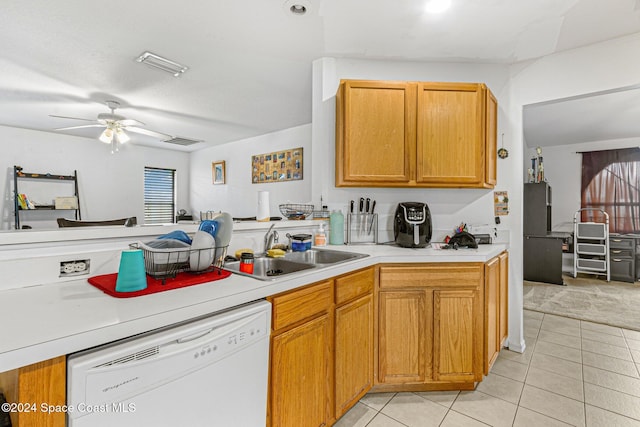 kitchen featuring dishwasher, refrigerator, sink, ceiling fan, and light tile patterned flooring