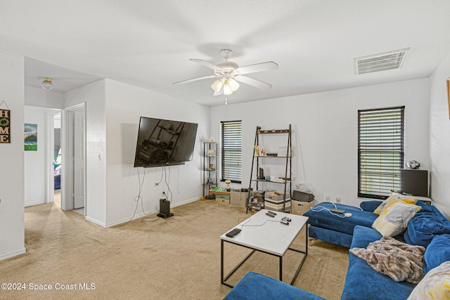 living room featuring ceiling fan