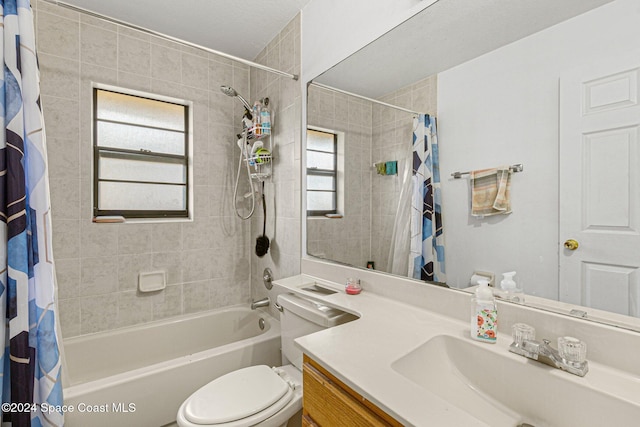 full bathroom featuring vanity, toilet, and shower / bath combo