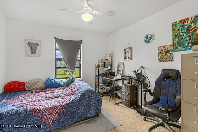 bedroom with ceiling fan and carpet