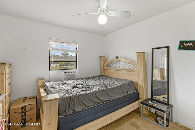 carpeted bedroom with ceiling fan and cooling unit