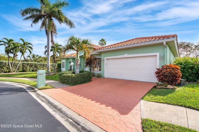 view of front of property with a garage