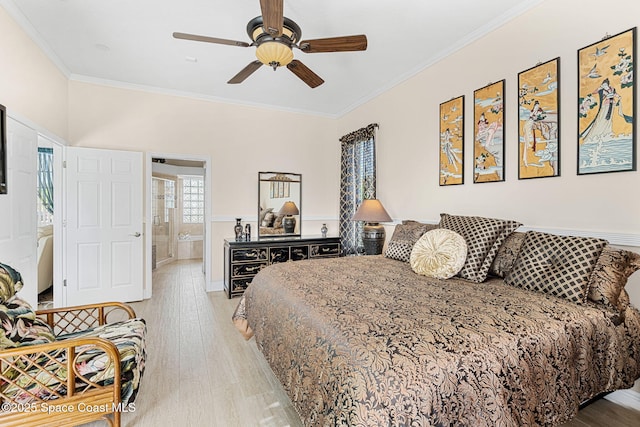 bedroom with ensuite bath, ceiling fan, light hardwood / wood-style flooring, and crown molding