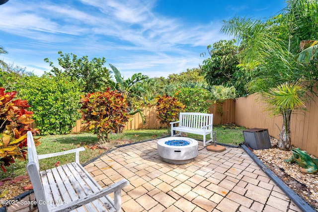 view of patio featuring a fire pit