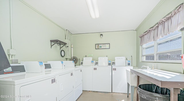 washroom featuring washer and clothes dryer