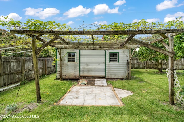 view of outdoor structure with a yard