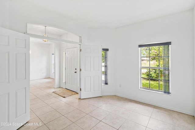 empty room featuring light tile patterned floors