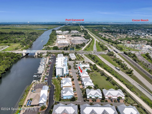 drone / aerial view with a water view