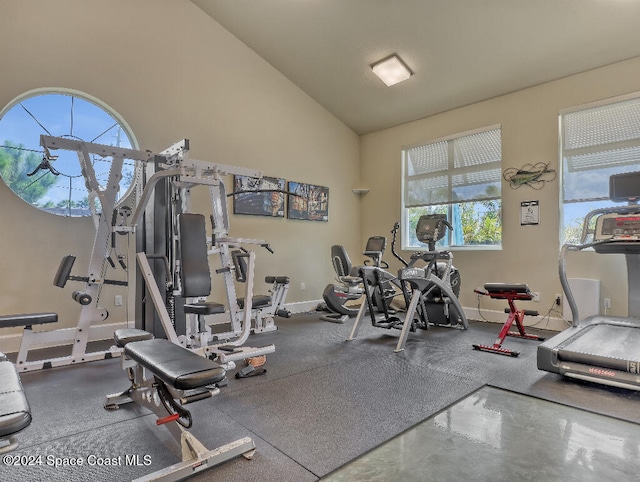 workout area with vaulted ceiling