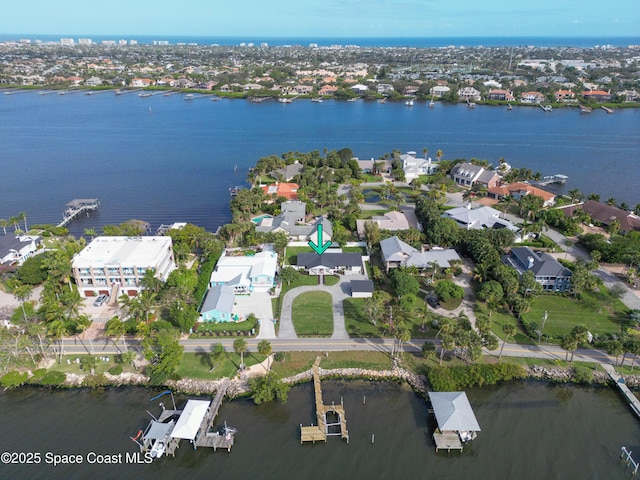 bird's eye view with a water view