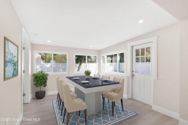 dining room with light hardwood / wood-style floors