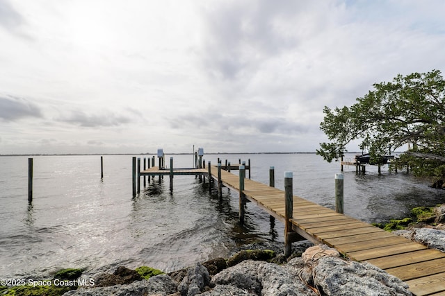 view of dock with a water view