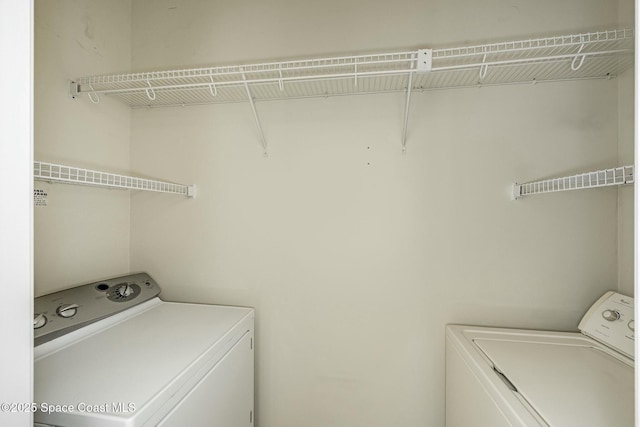 laundry area featuring independent washer and dryer