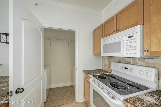 kitchen featuring tasteful backsplash, washer / clothes dryer, crown molding, and white appliances