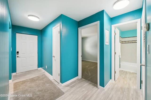 foyer with light hardwood / wood-style flooring