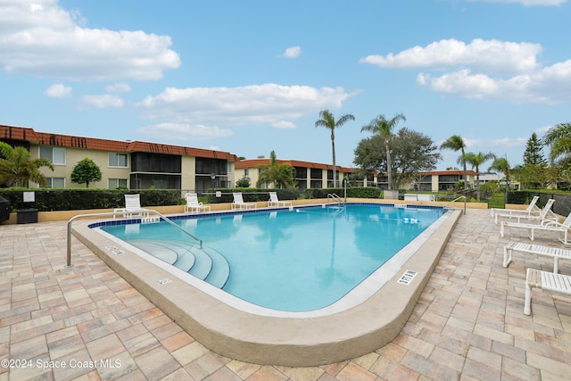 view of pool with a patio area