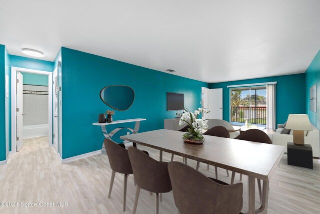 dining room featuring light hardwood / wood-style flooring